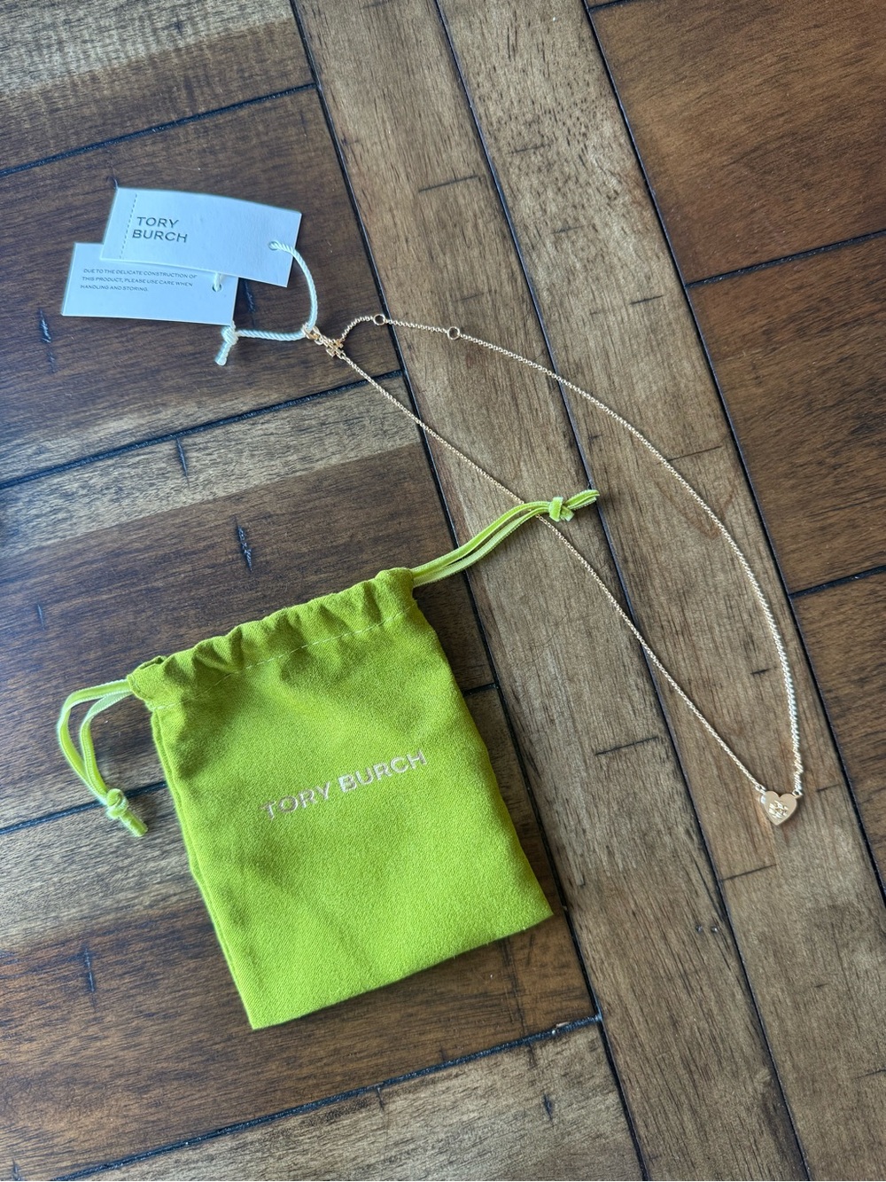 Tory Burch Gold Heart Pendant Necklace with Lime Green Pouch